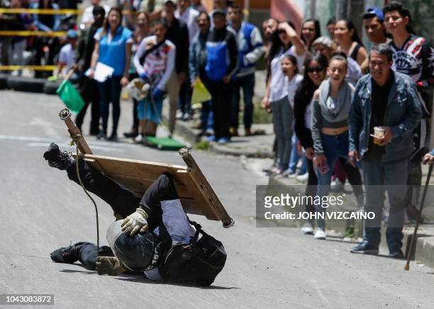 Participant crashes his cart during the Formula 1 homemade carts festival at Perseverancia neighbourhood in Bogota, Colombia on September 29, 2018.