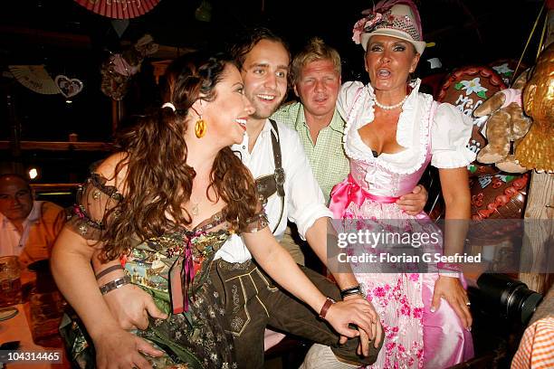 Claudia Effenberg, Stefan Effenberg, actress Simone Thomalla and boyfriend Silvio Heinevetter attend the third evening of the Oktoberfest 2010 at...