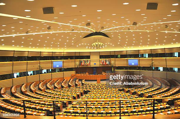 empty european parliament assembly room, brussels, belgium - european parliament stock pictures, royalty-free photos & images