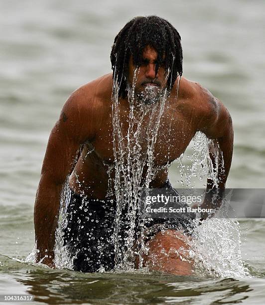 Harry O'Brien of the Magpies dives into the water during a Collingwood Magpies AFL recovery session at St Kilda Sea Baths on September 21, 2010 in...