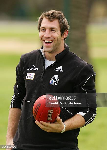 Travis Cloke of the Magpies laughs during a Collingwood Magpies AFL recovery session at St Kilda Sea Baths on September 21, 2010 in Melbourne,...