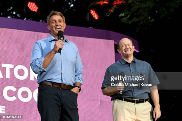 United States Senators Jeff Flake and Chris Coons speak onstage during the 2018 Global Citizen Concert at Central Park, Great Lawn on September 29,...