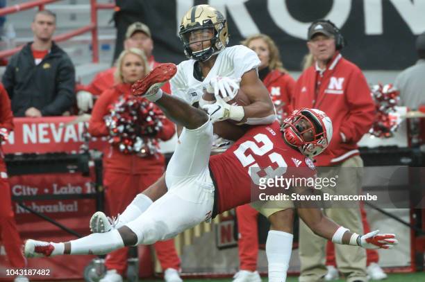 Defensive back Dicaprio Bootle of the Nebraska Cornhuskers defends against wide receiver Jared Sparks of the Purdue Boilermakers at Memorial Stadium...