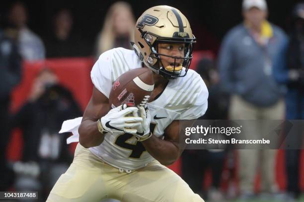 Wide receiver Rondale Moore of the Purdue Boilermakers returns a kick in the second half against the Nebraska Cornhuskers at Memorial Stadium on...