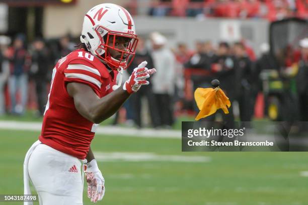 Wide receiver JD Spielman of the Nebraska Cornhuskers tosses a penalty flay back to an official after a call in the game against the Purdue...