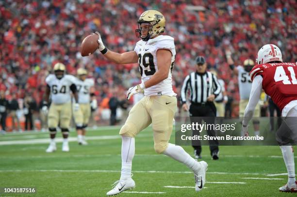 Tight end Brycen Hopkins of the Purdue Boilermakers steps into the end zone for a touchdown in the second half against the Nebraska Cornhuskersat...