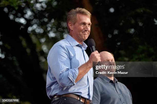 Senator Jeff Flake and Senator Chris Coons speak onstage during the 2018 Global Citizen Festival: Be The Generation in Central Park on September 29,...