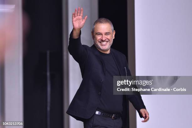 Fashion designer Elie Saab walks the runway during the Elie Saab show as part of the Paris Fashion Week Womenswear Spring/Summer 2019 on September...