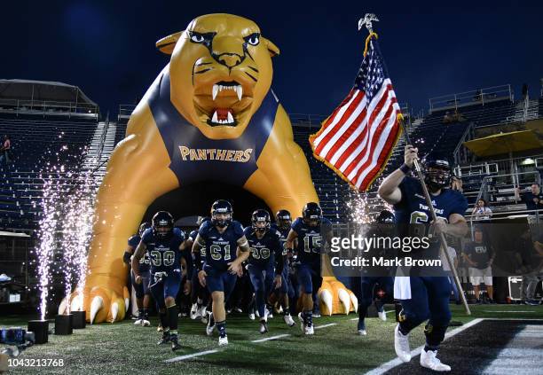 The FIU Golden Panthers take the field before the game against the Arkansas-Pine Bluff Golden Lions at Ricardo Silva Stadium on September 29, 2018 in...