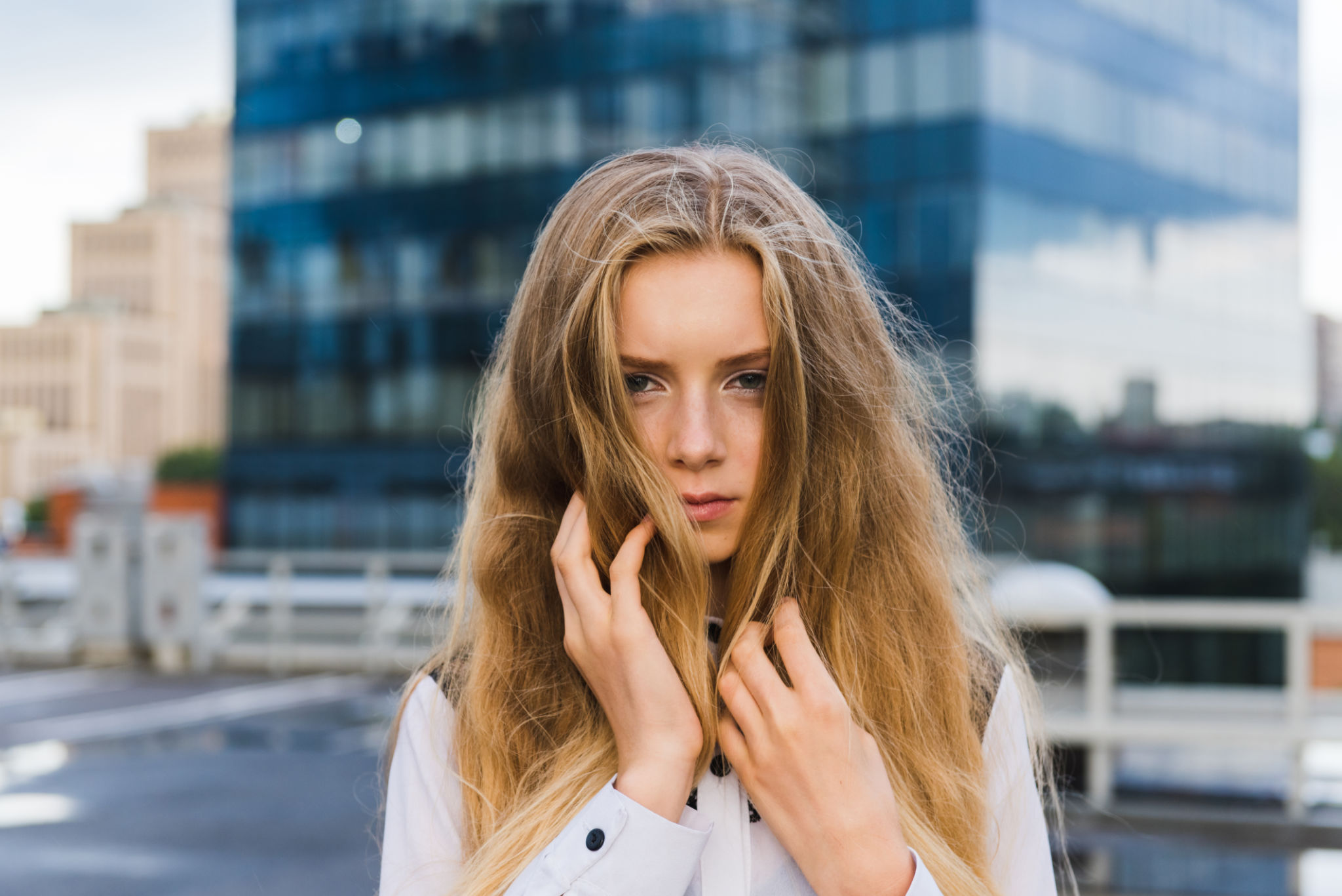Attractive and sad female at downtown outdoors Attractive and sad female at downtown outdoors