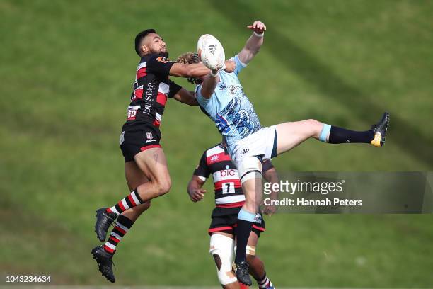 Sione Molia of Counties Manukau competes with Scott Gregory of Northland for the ball during the round seven Mitre 10 Cup match between Counties...
