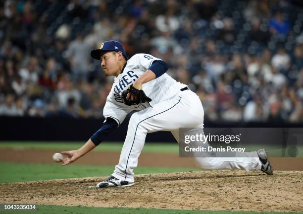 Kazuhisa Makita of the San Diego Padres pitches during the ninth inning of a baseball game against the Arizona Diamondbacks at PETCO Park on...