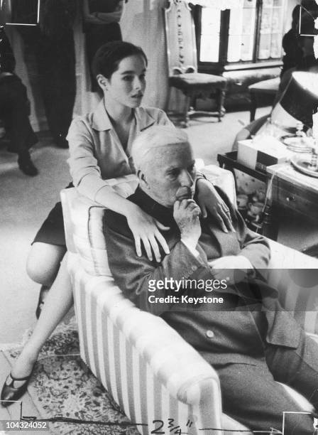Comic actor Charlie Chaplin with his daughter Geraldine on his 70th birthday at the Manoir de Ban, Switzerland, 16th April 1959.