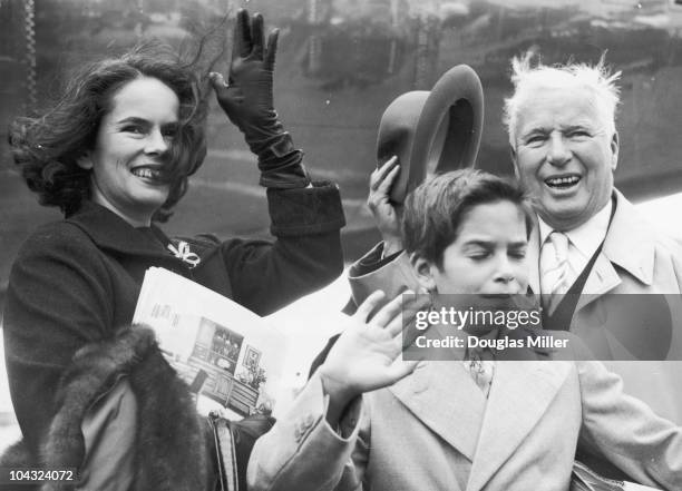 Comic actor Charlie Chaplin with his wife Oona O'Neill and their son Michael, at London Airport , 9th September 1957. They are in London for the...