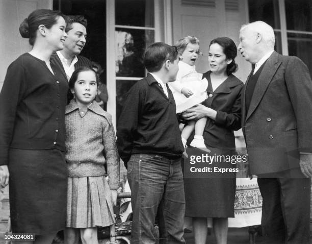 Comic actor Charlie Chaplin with his wife Oona O'Neill and their children on his 70th birthday at the Manoir de Ban, Switzerland, 16th April 1959....