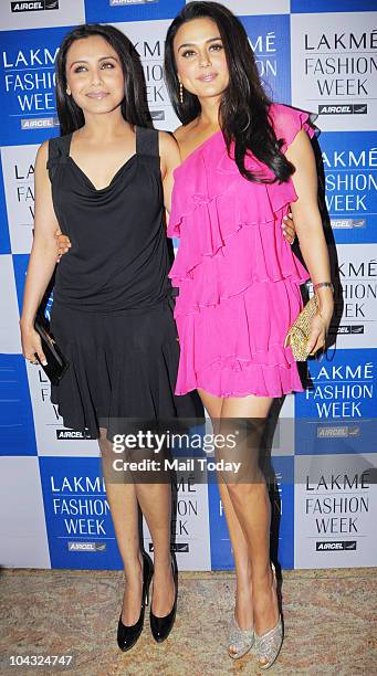 Preity Zinta and Rani Mukherjee at designer Manish Malhotra's show on the fourth day of Lakme Fashion Week in Mumbai on September 20, 2010.