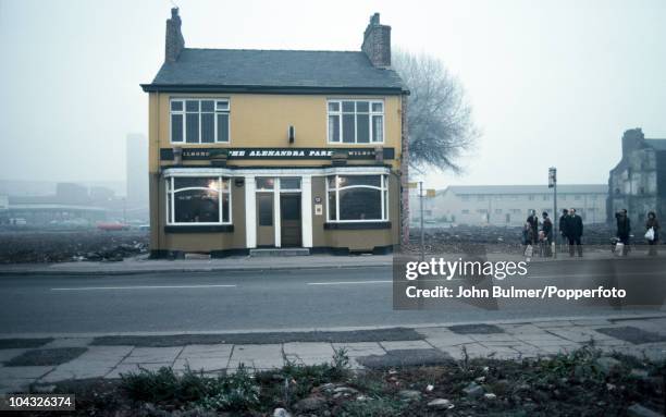 Bus stop outside The Alexandra Park pub in Manchester, England in 1976.