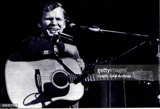 Photo of American singer and guitarist Doc Watson