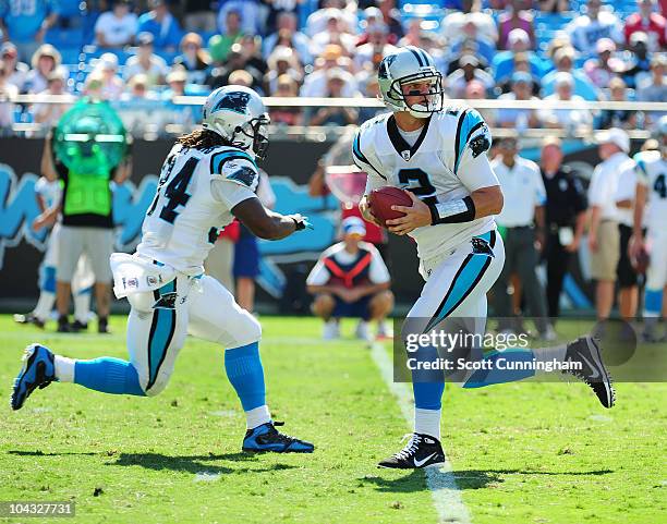 Jimmy Clausen of the Carolina Panthers drops back to pass against the Tampa Bay Buccaneers at Bank of America Stadium on September 19, 2010 in...