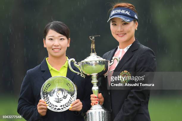Miyu Goto of Japan and So Yeon Ryu of South Korea pose with trophy after the Japan Women's Open Golf Championship at Chiba Country Club Noda Course...
