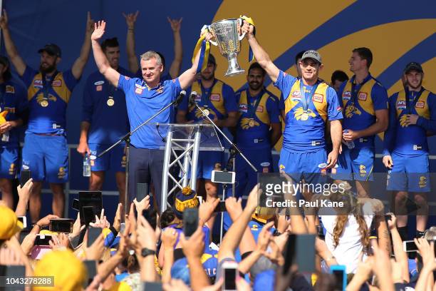 Adam Simpson and Shannon Hurn show the premiership cup to the fans after winning yesterday's AFL Grand Final at Langley Park on September 30, 2018 in...