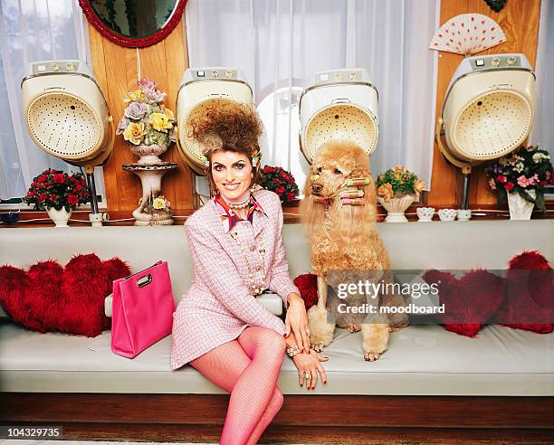 woman with pet poodle at retro hair salon - beauty salon stock pictures, royalty-free photos & images