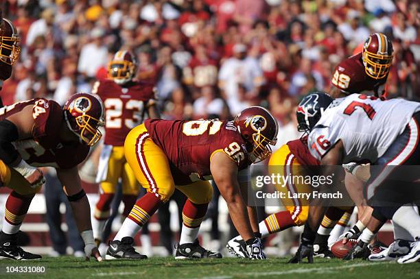 Ma'ake Kemoeatu of the Washington Redskins defends against the Houston Texans at FedExField on September 19, 2010 in Landover, Maryland. The Texans...