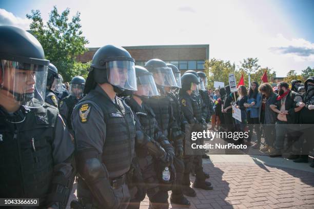 Police standoff with protesters during an open carry rally at Kent State University in Kent, Ohio on September 29, 2018.