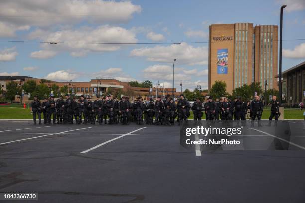 Ohio State Troopers mass up in a parking lot across from the Kent State University before the Open Carry Rally. Kaitlin Bennett, a former student of...