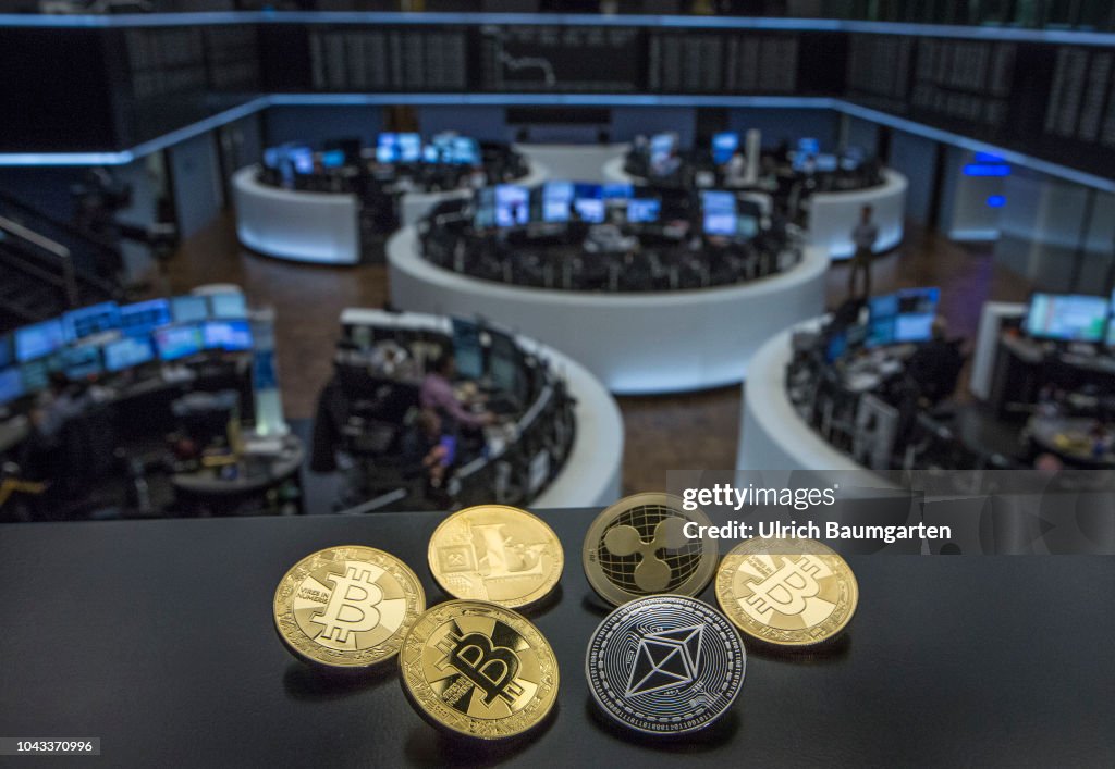 Symbol photo on the topics digital currencys, cryptocurrency, currency speculation - Bitcoin, Ripple, Ethereum, Litecoin.