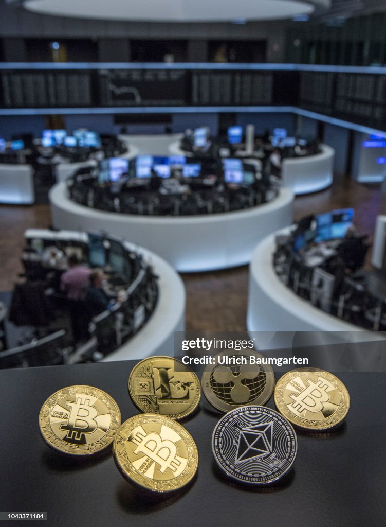 Symbol photo on the topics digital currencys, cryptocurrency, currency speculation - Bitcoin, Ripple, Ethereum, Litecoin.