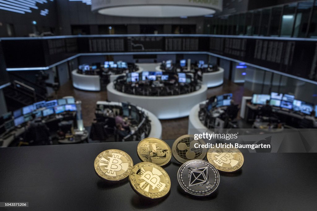 Symbol photo on the topics digital currencys, cryptocurrency, currency speculation - Bitcoin, Ripple, Ethereum, Litecoin.