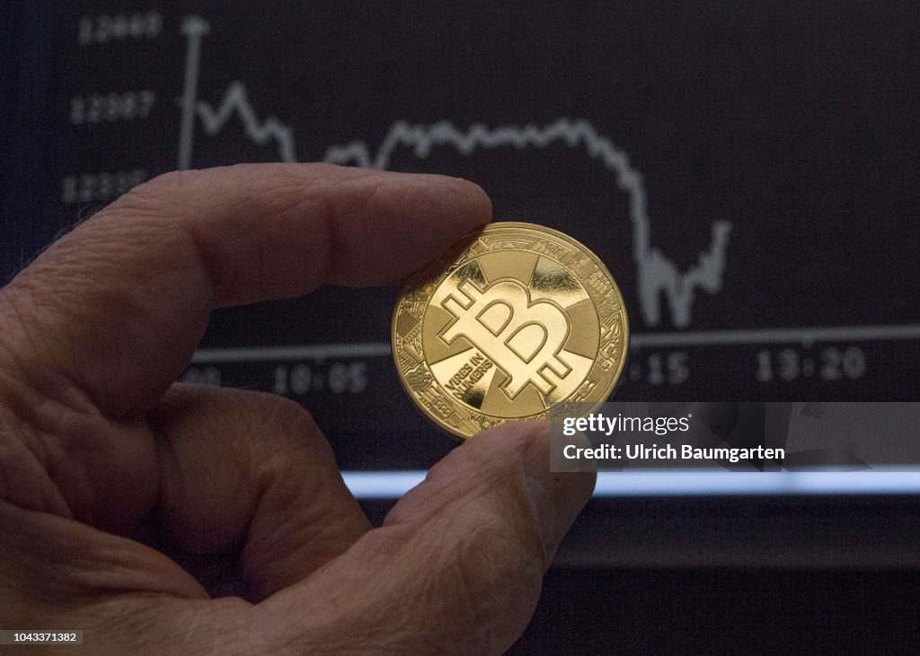 Symbol photo on the topics digital currencys, cryptocurrency, currency speculation - Bitcoin.