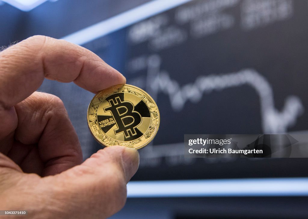 Symbol photo on the topics digital currencys, cryptocurrency, currency speculation - Bitcoin.