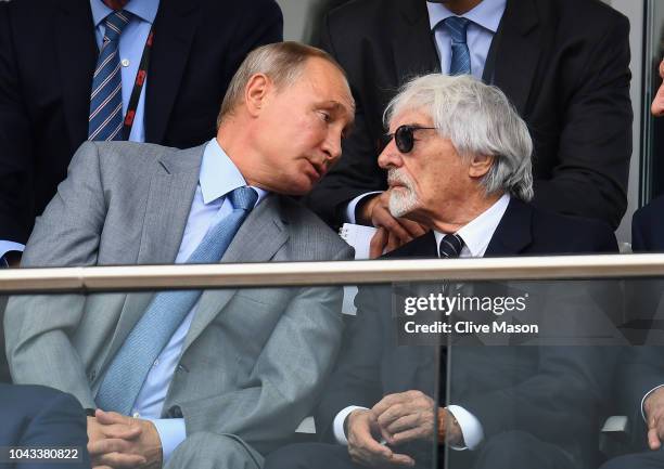 Bernie Ecclestone, Chairman Emeritus of the Formula One Group, and Russia President Vladimir Putin talk during the Formula One Grand Prix of Russia...