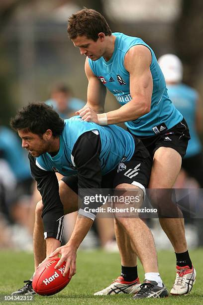 Paul Medhurst gathers the ball during a Collingwood Magpies AFL training session at Gosch's Paddock on September 22, 2010 in Melbourne, Australia.