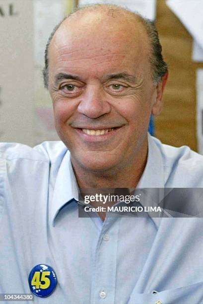 Brazilian presidential candidate Jose Serra, of the ruling Brazilian Social Democratic party smiles after casting his vote at a school in Sao Paulo,...