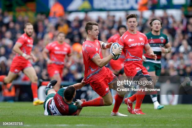 Ben Youngs of Leicester Tigers tackles Josh Strauss of Sale Sharks during the Gallagher Premiership Rugby match between Leicester Tigers and Sale...