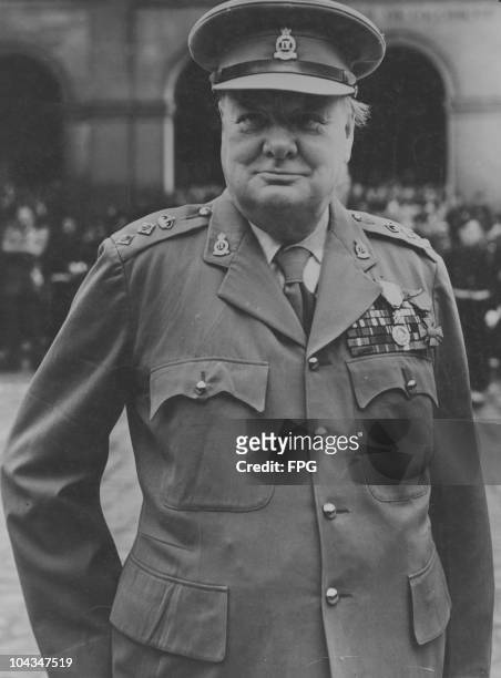 Former British Prime Minister Winston Churchill receives the Medaille Militaire at Les Invalides in Paris, on the 2nd anniversary of VE Day, 8th May...