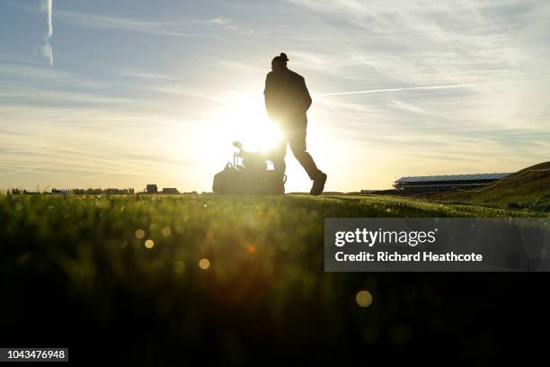 Greenskeepers prepare the course ahead of the 2018 Ryder Cup at Le Golf National on September 24, 2018 in Paris, France.