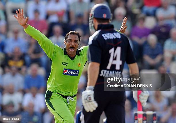 Pakistan's bowler Shoaib Akhtar , celebrates taking the wicket of England's Andrew Strauss, on the fifth One Day International cricket match between...