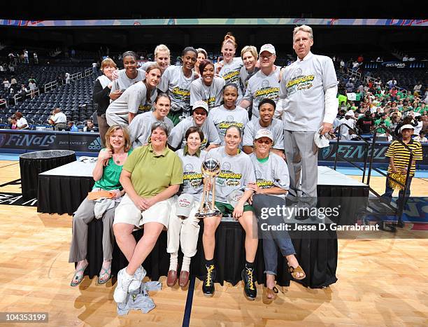 The Seattle Storm poses with the WNBA Championship Trophy after defeating the Atlanta Dream in Game Three of the 2010 WNBA Finals on September 16,...