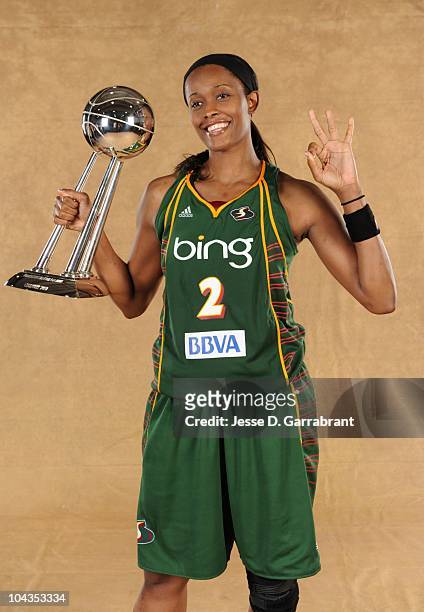 Swin Cash of the Seattle Storm poses with the WNBA Championship Trophy after defeating the Atlanta Dream in Game Three of the 2010 WNBA Finals on...