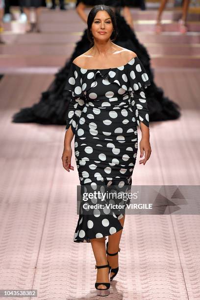 Monica Bellucci walks the runway at the Dolce & Gabbana Ready to Wear fashion show during Milan Fashion Week Spring/Summer 2019 on September 23, 2018...