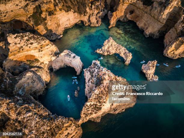 algarve, aerial view in the morning. portugal - ponta da piedade stock pictures, royalty-free photos & images