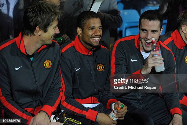 Bebe sits alongside Edwin van der Sar and John O'Shea on the bench during the Carling Cup 3rd Round match between Scunthorpe United and Manchester...