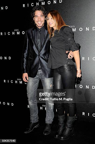 Daniele Santoianni and Flo attend the John Richmond Milan Fashion Week Womenswear S/S 2011 show on September 22, 2010 in Milan, Italy.