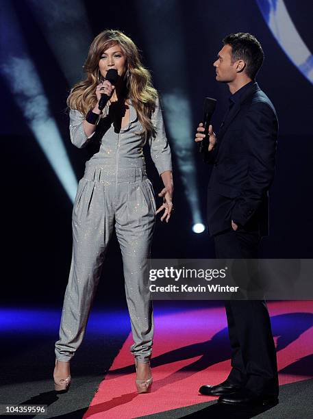 Singer Jennifer Lopez and host Ryan Seacrest appear onstage at a press conference to officially announce the season 10 "American Idol" judges panel...