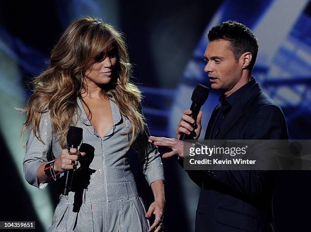 Singer Jennifer Lopez and host Ryan Seacrest appear onstage at a press conference to officially announce the season 10 "American Idol" judges panel...