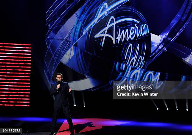 Host Ryan Seacrest appears onstage at a press conference to officially announce the season 10 "American Idol" judges panel at The Forum on September...